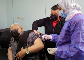 A man receives a dose of a vaccine against the coronavirus disease (COVID-19) in Cairo, Egypt March 4, 2021. REUTERS/Mohamed Abd El Ghany